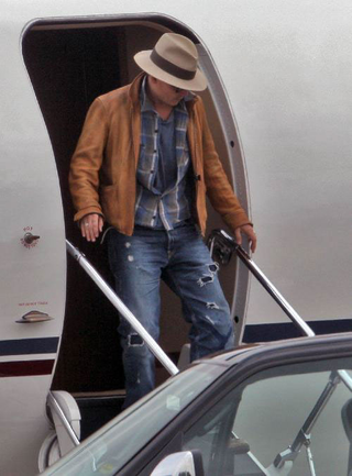 Illustration for article titled Jennifer & John Tread Water; Johnny Depp Flies Fancy